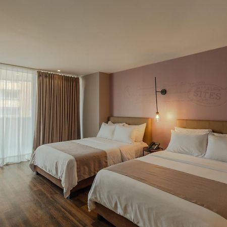 Sites Hotel Медельїн Екстер'єр фото A room at the hotel