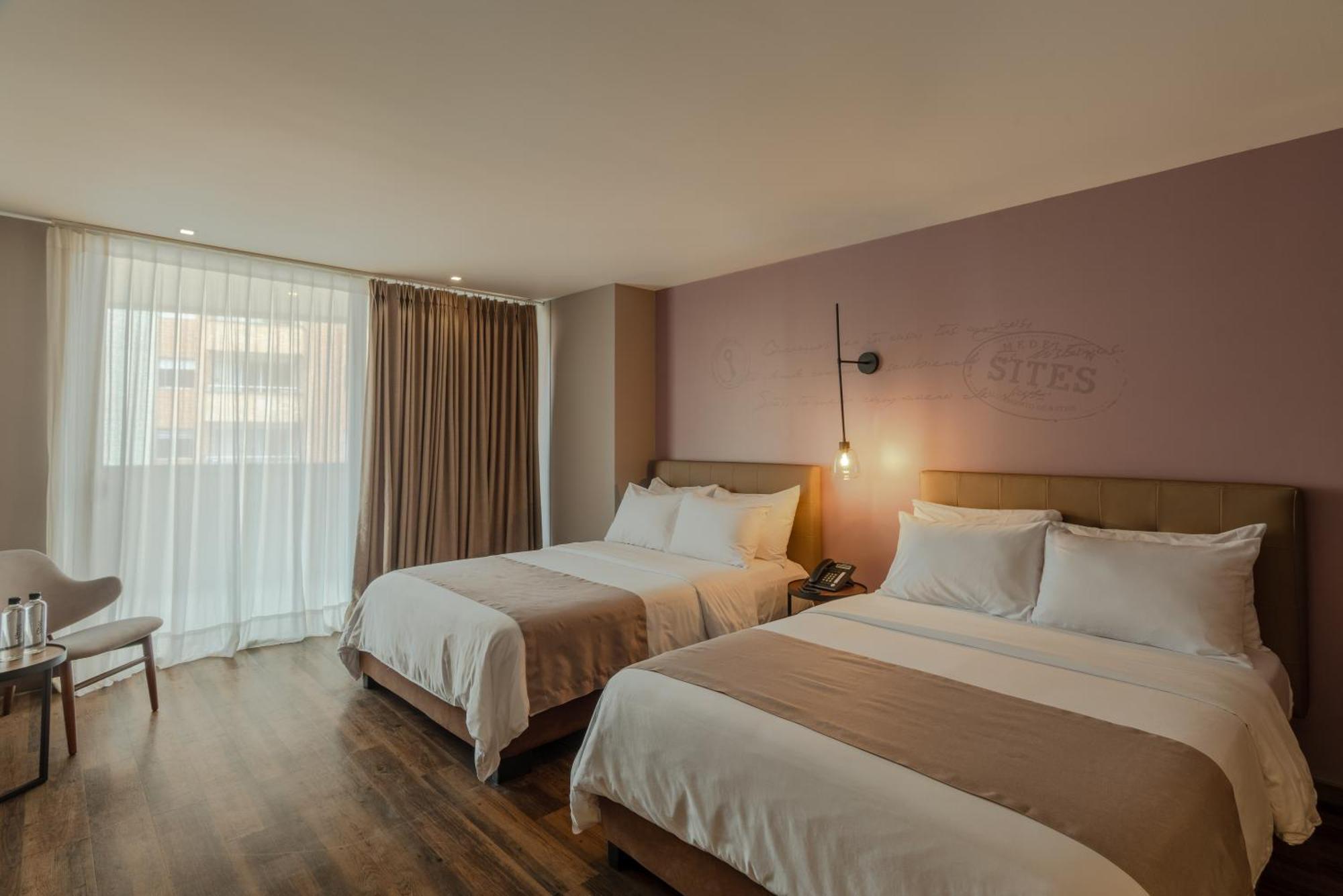Sites Hotel Медельїн Екстер'єр фото A room at the hotel