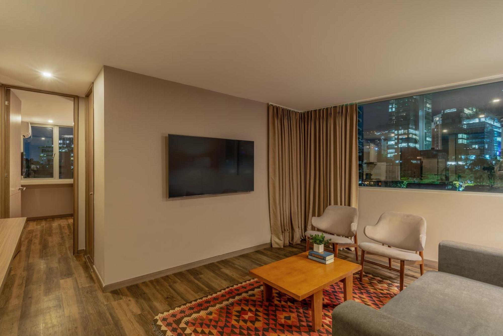 Sites Hotel Медельїн Екстер'єр фото A living room in a modern apartment